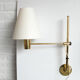 Pair orientable sconces V-393 Hans-Agne Jakobsson for AB Markaryd Sweden, brass