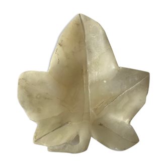 Empty pocket in the shape of alabaster ivy leaves