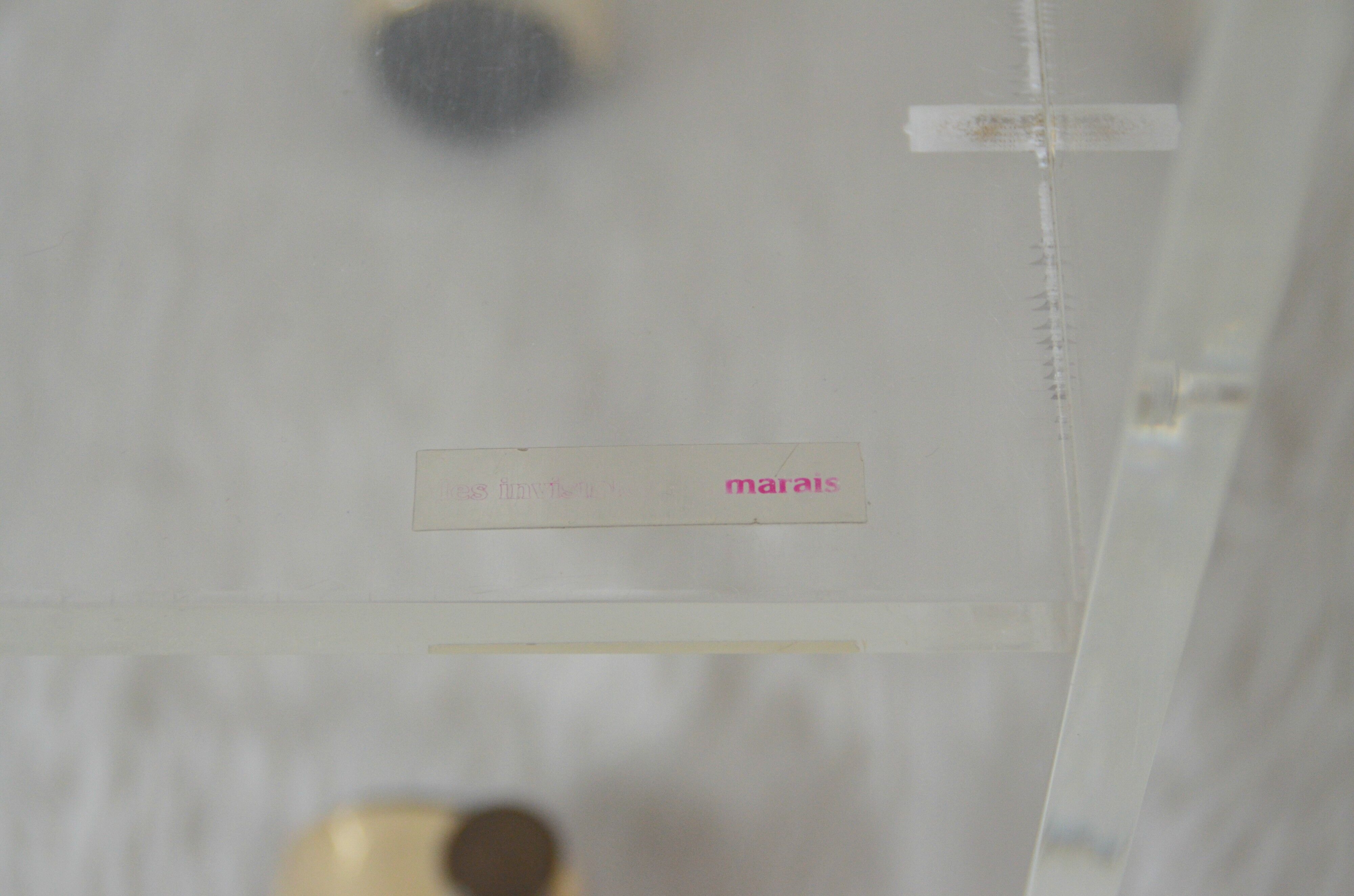 The swamp invisible Plexiglas side table