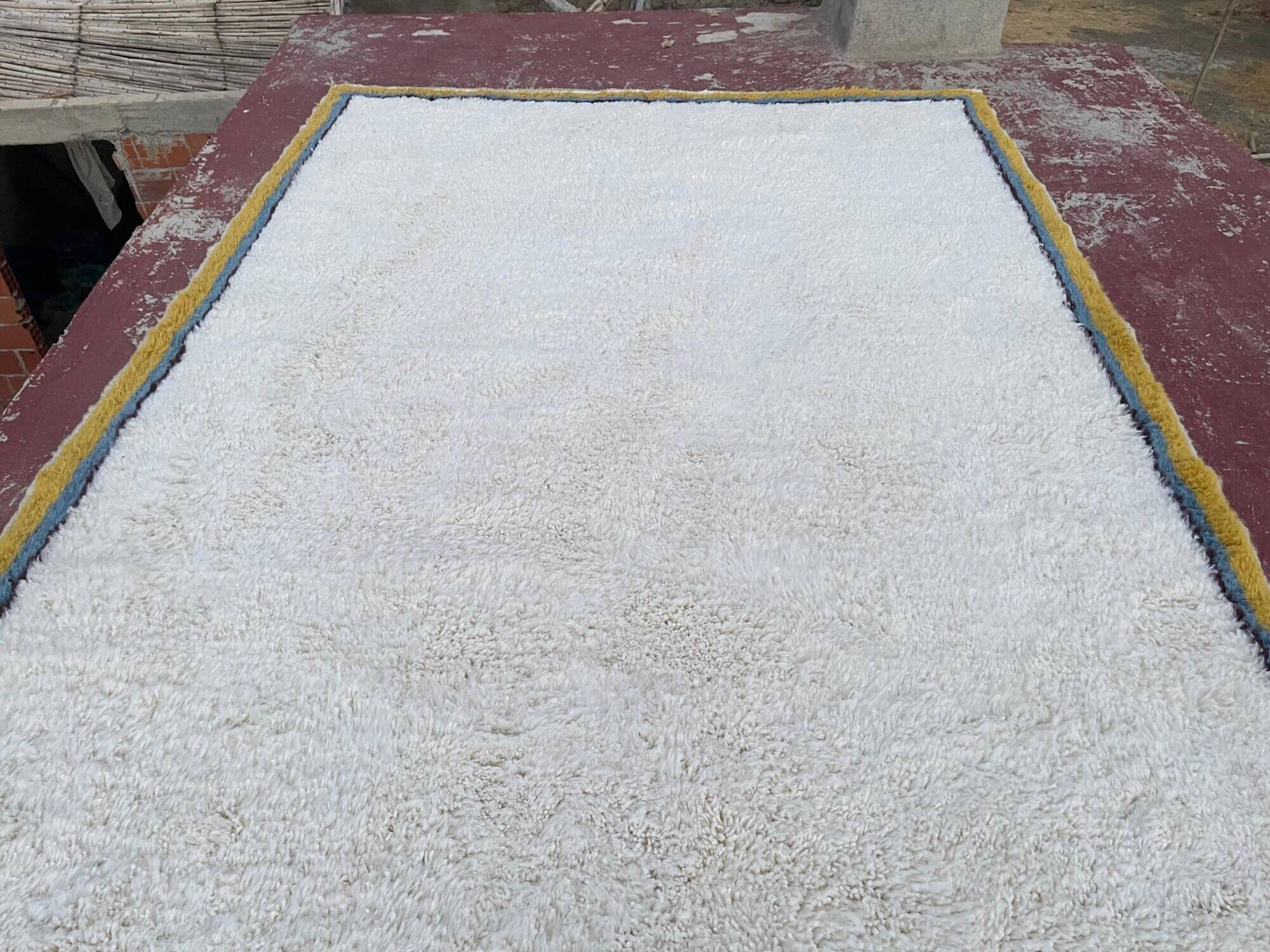 Large Moroccan Berber rug in cream 400x250 cm – yellow and blue border