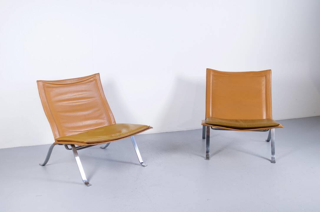 Imposing pair of leather and steel armchairs from the 1960s