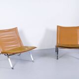 Imposante paire de fauteuils cuir et acier années 60'