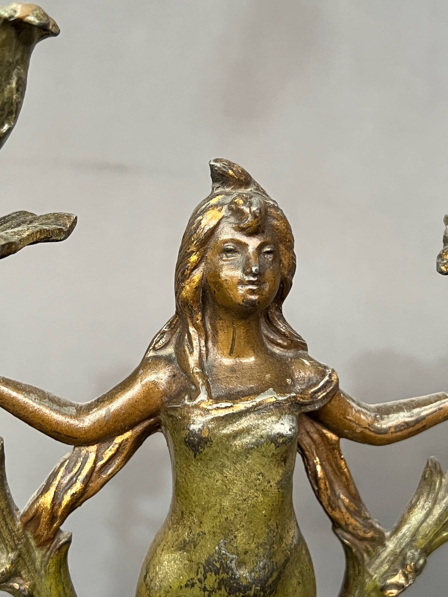 Pair of antique Art Nouveau candlesticks.