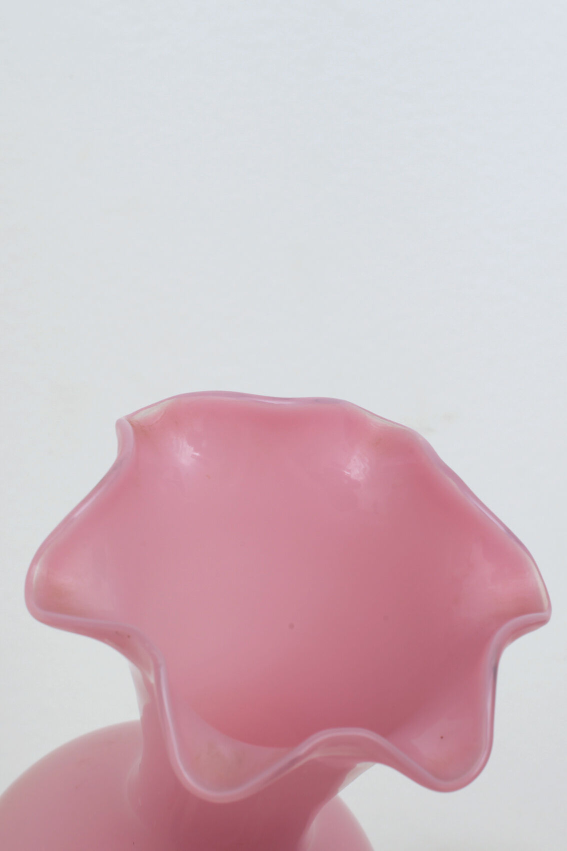 Pink vase foot twisted milk glass