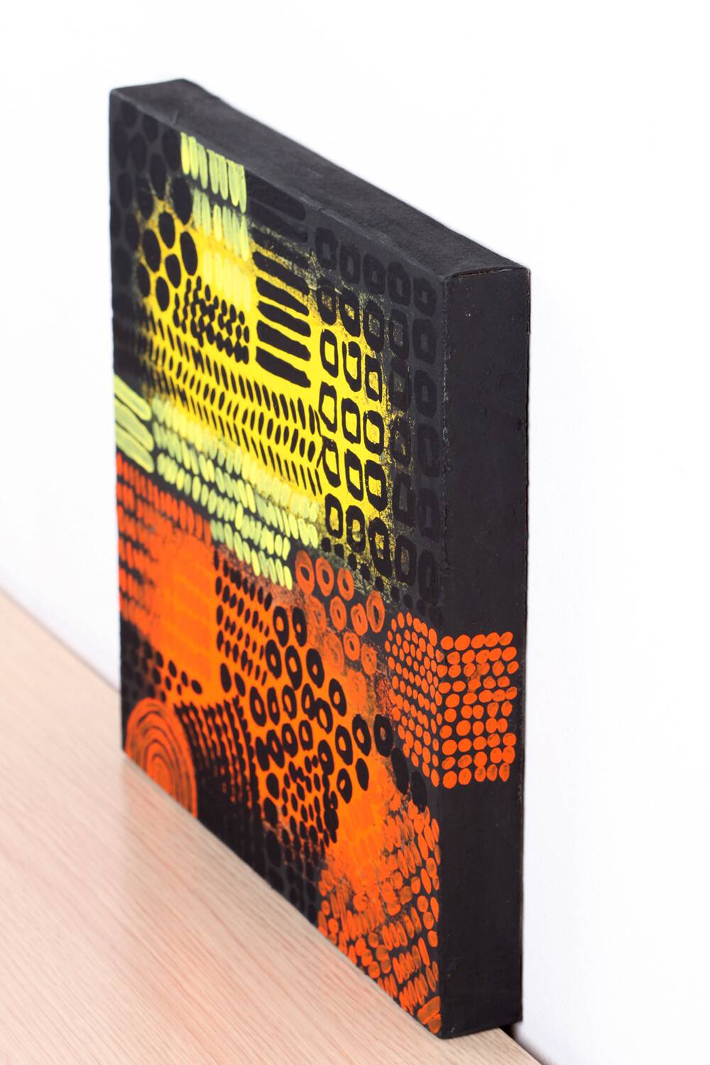 Orange, black and yellow abstract acrylic painting on stretched canvas