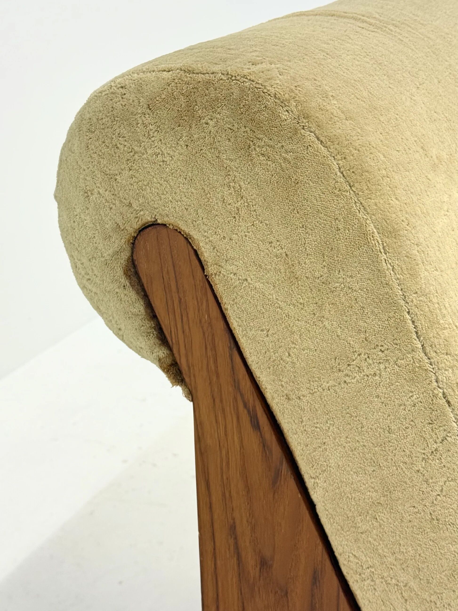 Vintage mid-century beige armchair with wooden frame and ottoman