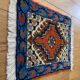 Oriental rug in hand-woven wool from the 20th century