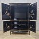 Vintage Chinese lacquer cabinet with black flowers and birds / bohemian