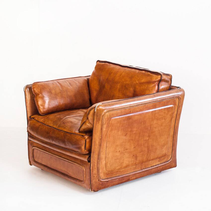Vintage club armchair by Roche Bobois. Camel buffalo leather. France, 1980s.