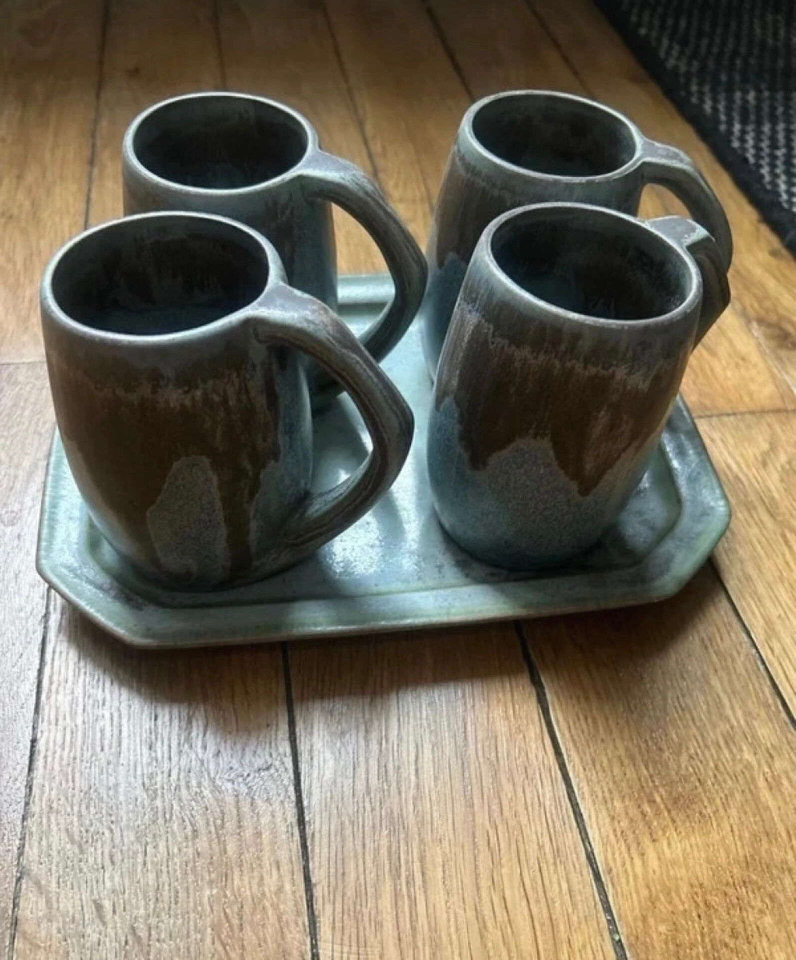 Set of 4 cups and 1 signed brutalist tray.