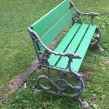 Early 1900's wood and cast iron bench with dog's head and snakes