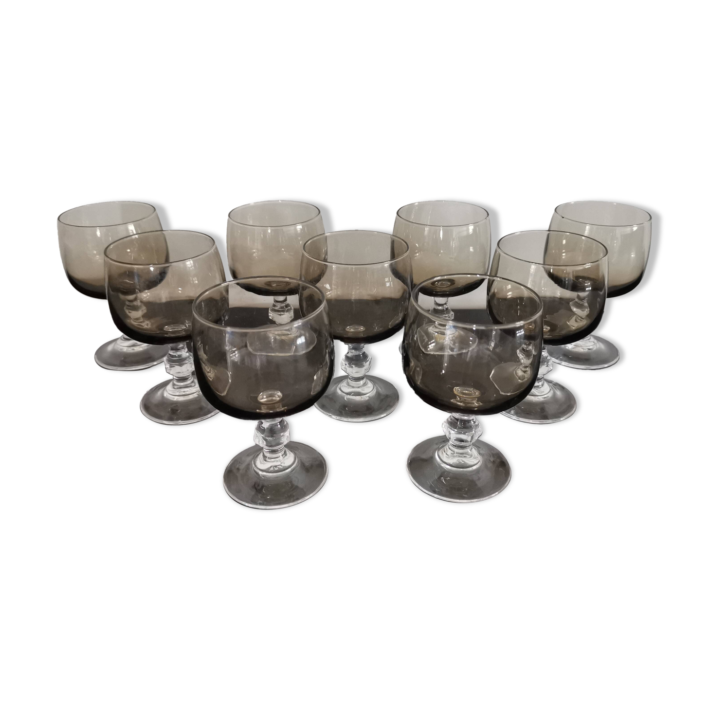 9 white wine glasses on vintage Luminarc smoked black stem