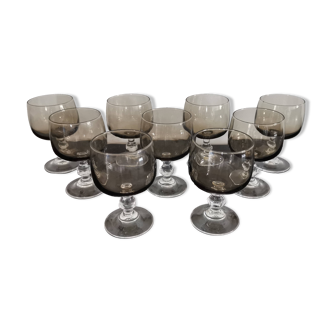 9 white wine glasses on vintage Luminarc smoked black stem