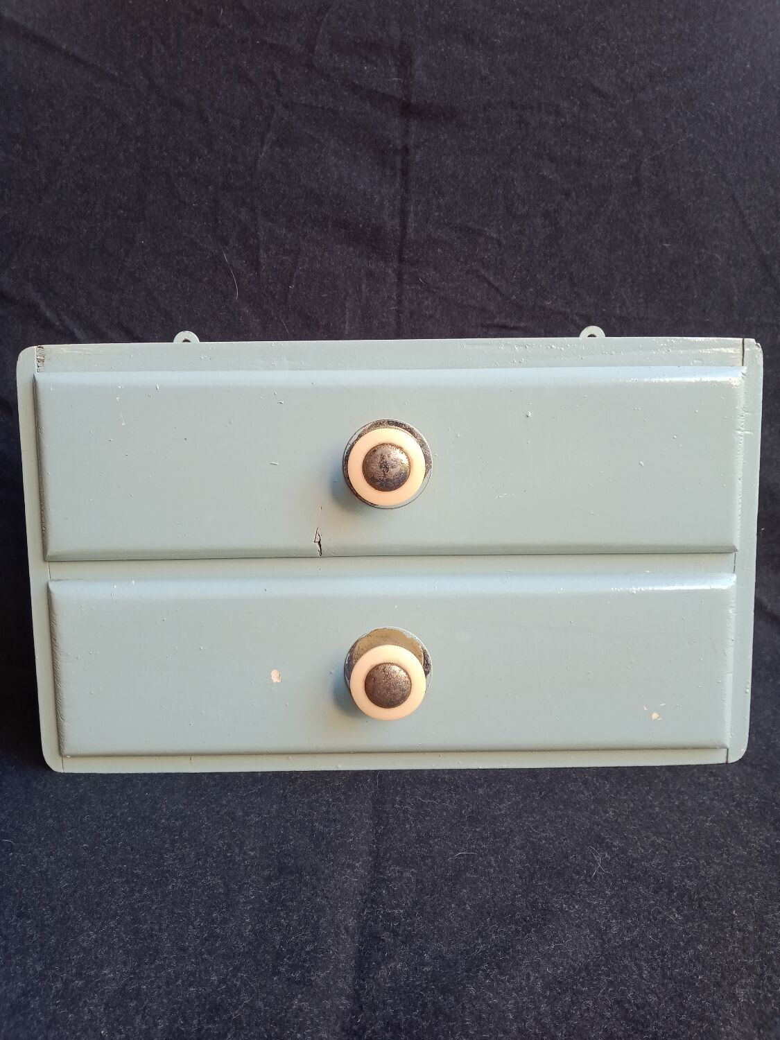 Wall-mounted storage unit with two drawers