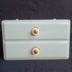 Wall-mounted storage unit with two drawers
