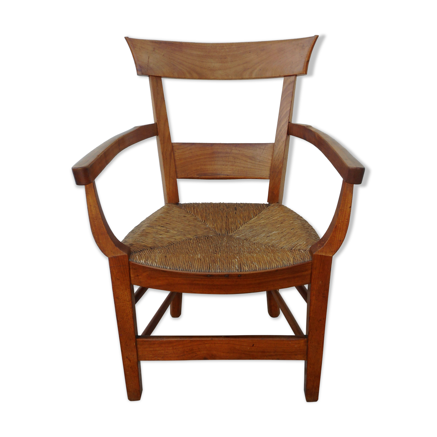Antique armchair in wood and straw