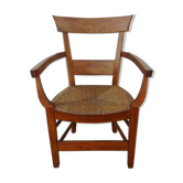 Antique armchair in wood and straw