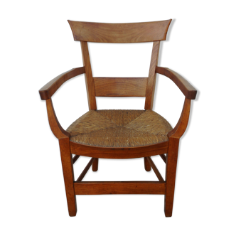 Antique armchair in wood and straw