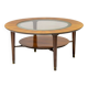 Sculptural coffee table in walnut and glass, Italy, 1950.