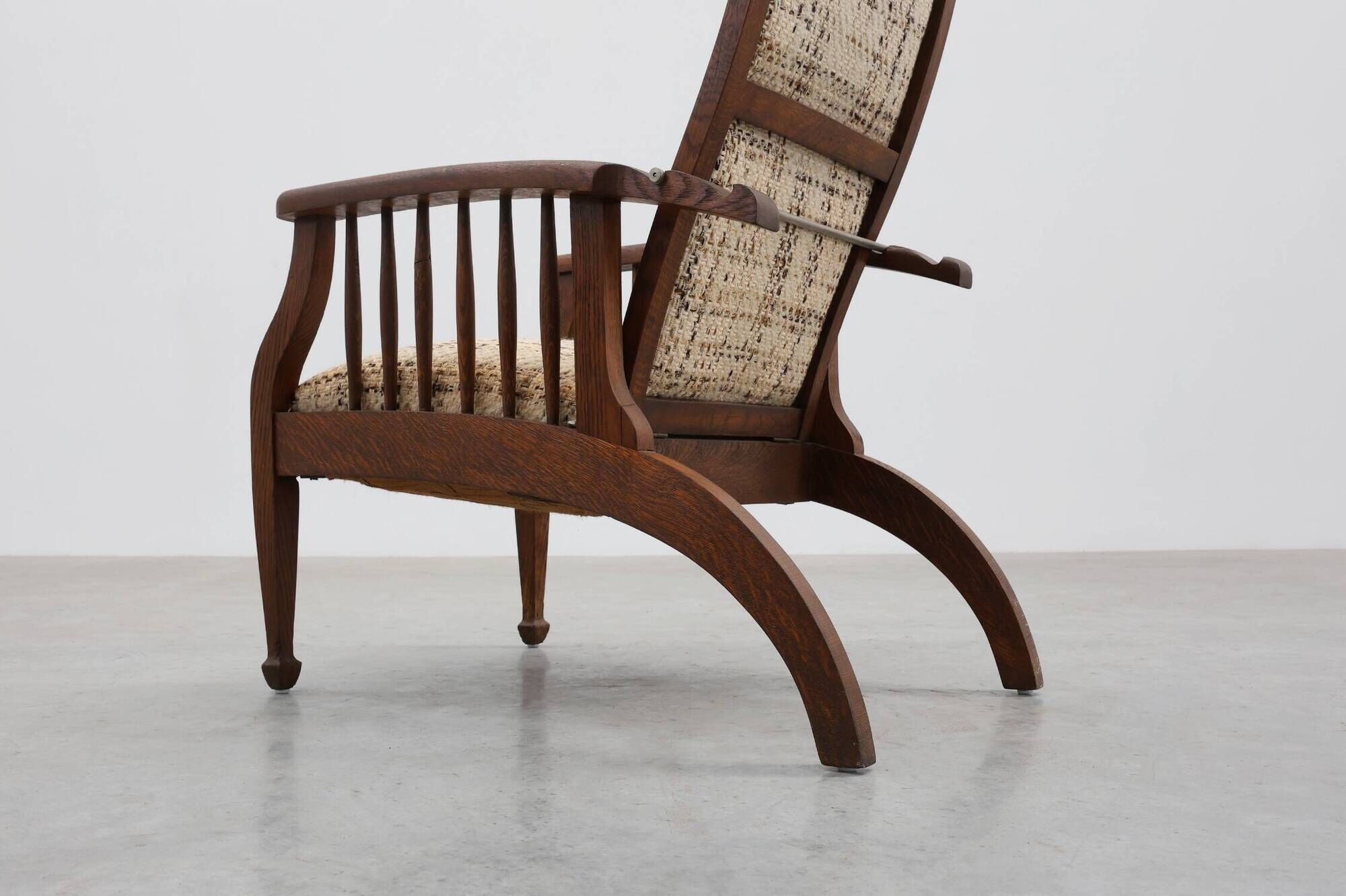 Arts & Craft oak armchair with spindle sides and tweed upholstery, Belgium