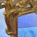 Carved and gilded wooden mirror with mercury ice sheet, Louis XV XVIIIth