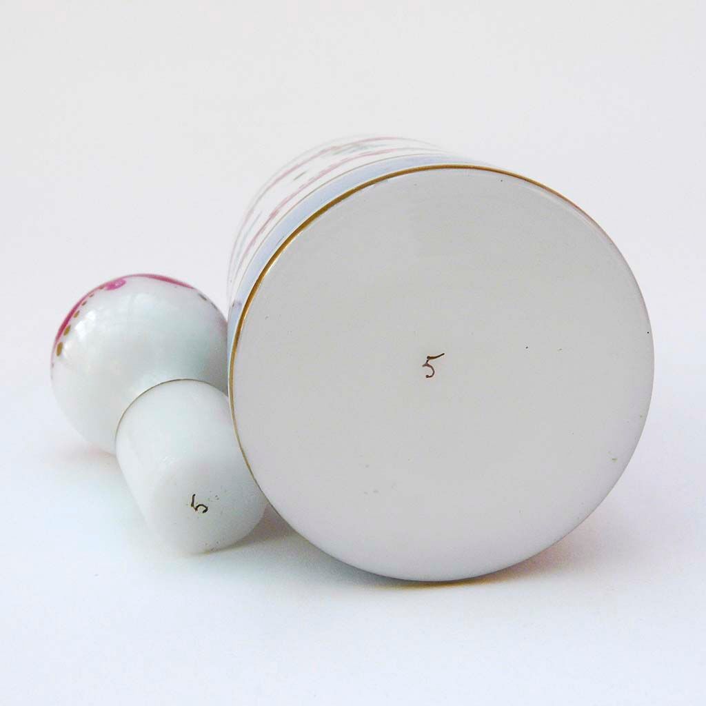 Bottle with floral decoration and antique gold edging