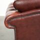 Vintage set of 2 cowhide leather Chesterfield armchairs in a brown colour