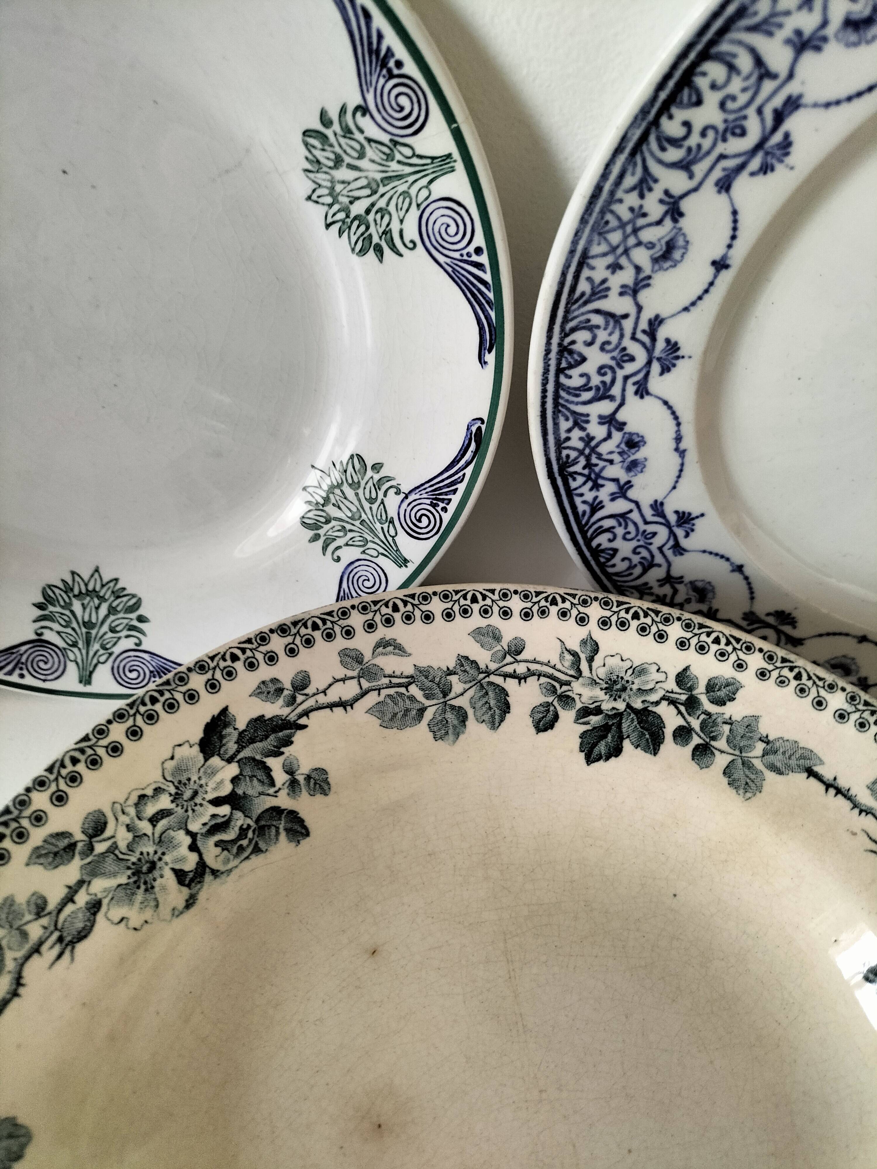 Set of 7 ironstone plates with floral friezes from the late 19th to early 20th century.