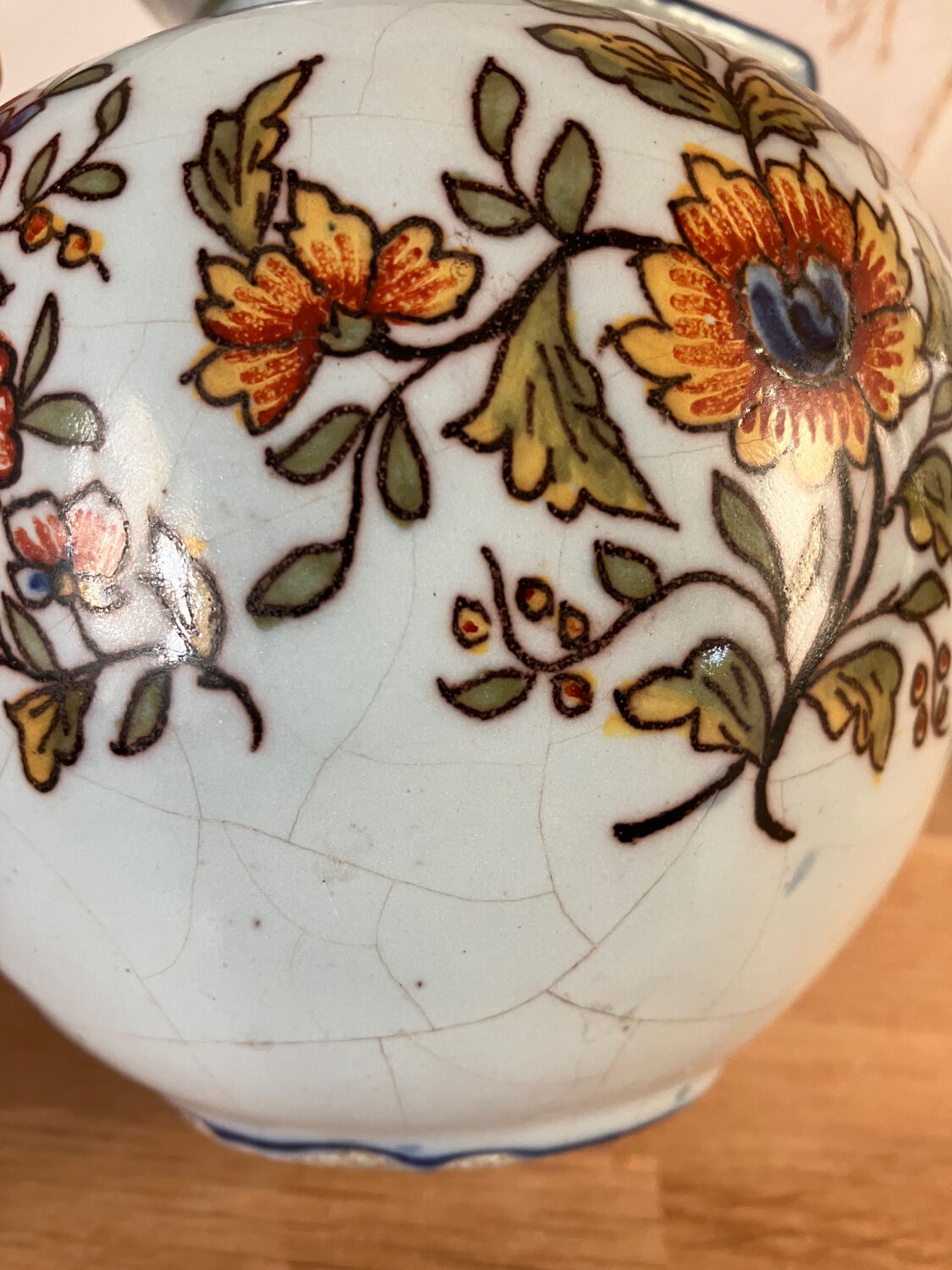 Old vase with floral motif inspired by desvres earthenware