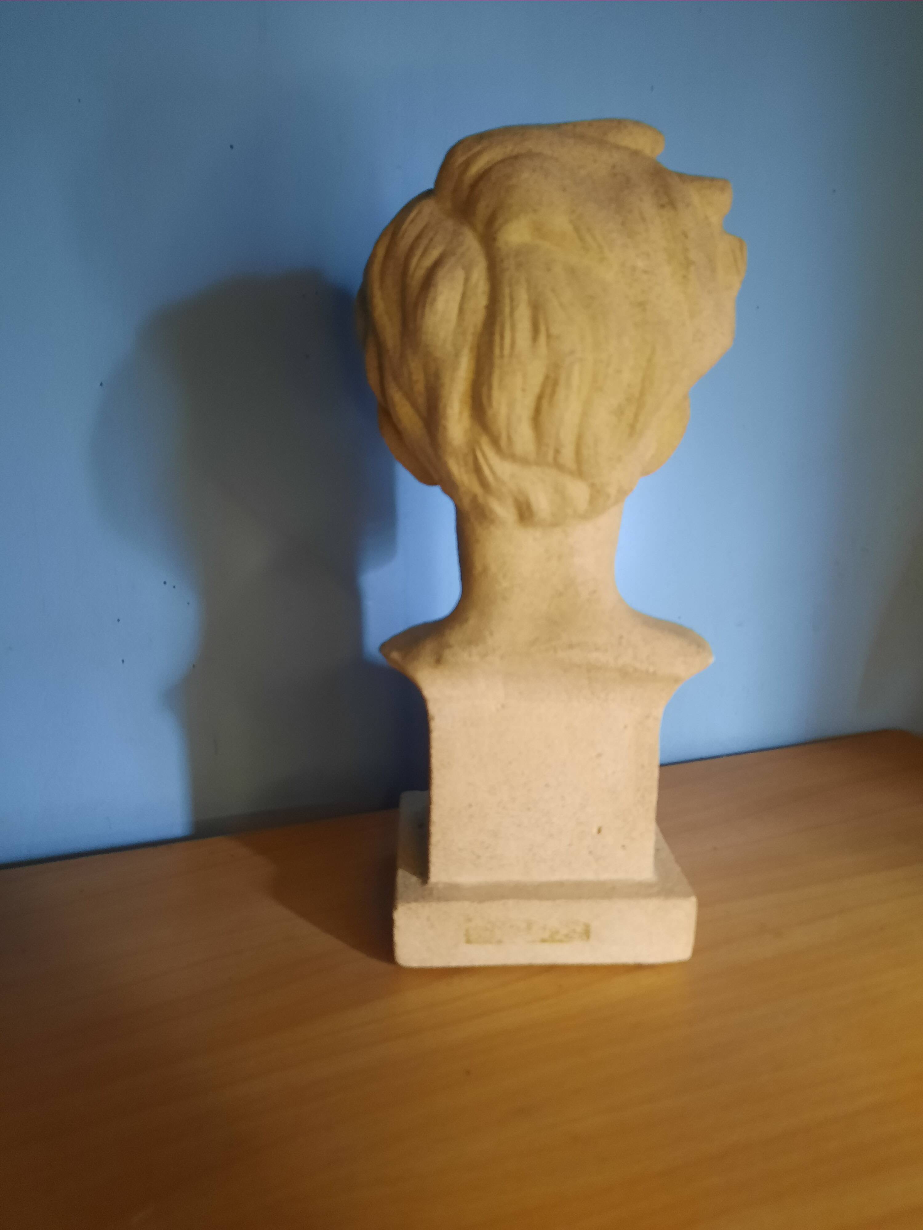 Bust of Arthur Rimbaud in stone