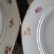 Lot de 8 assiettes en porcelaine à douze pans coupés – décor floral et
