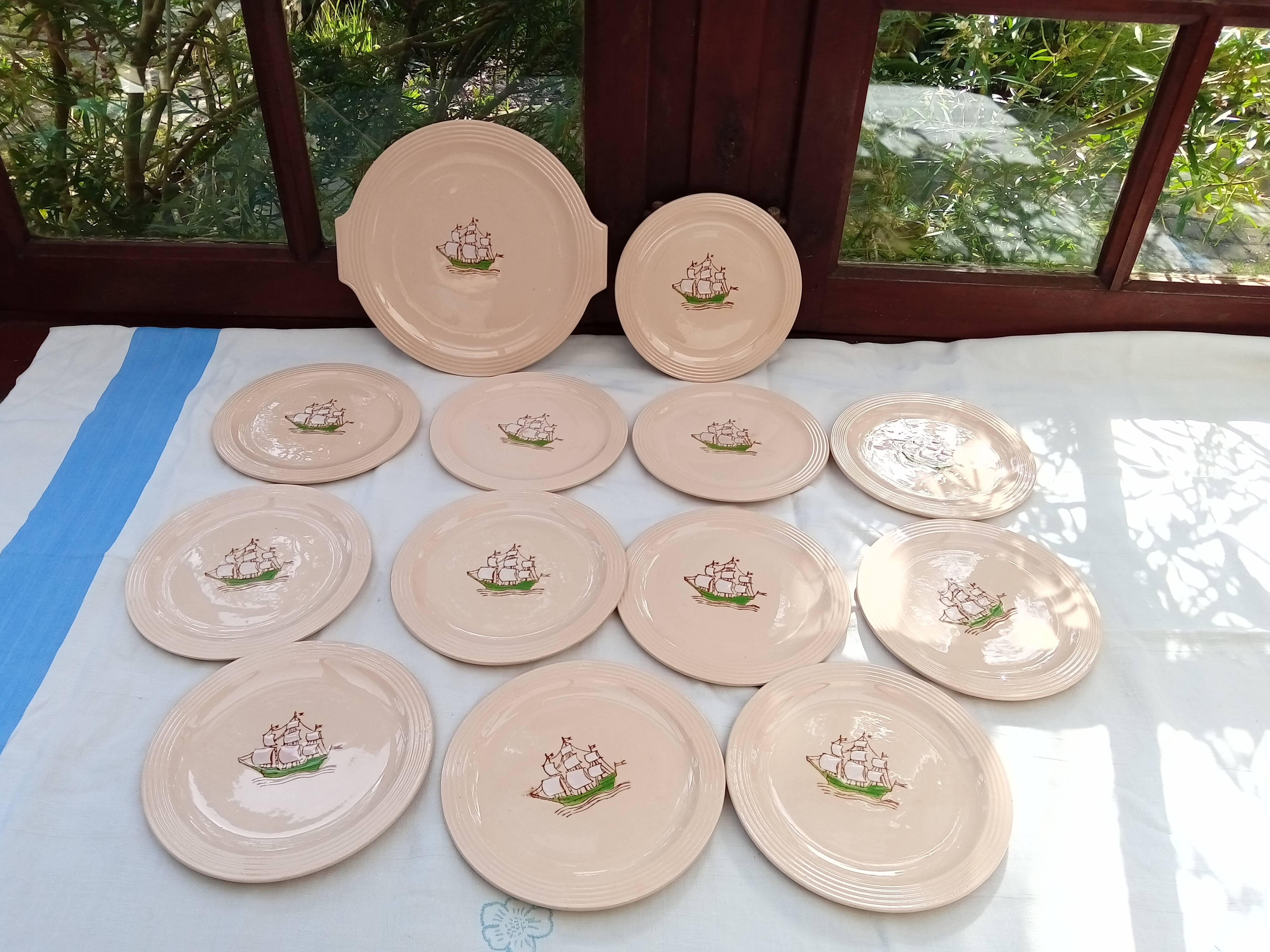 Set of 12 dessert plates and Longwy dish