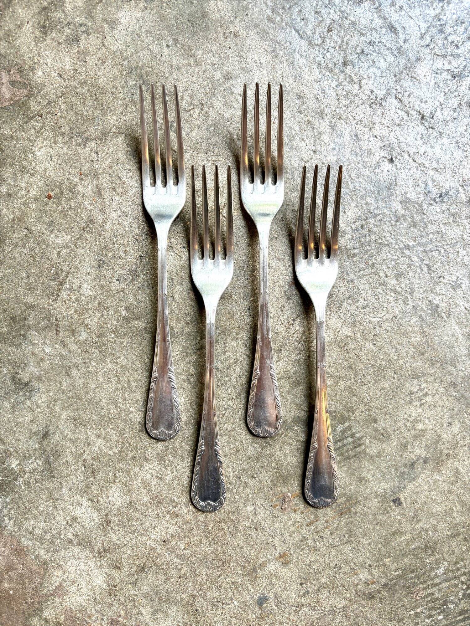 4 silver-plated forks