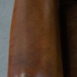 Sheep leather wingback chair with patina