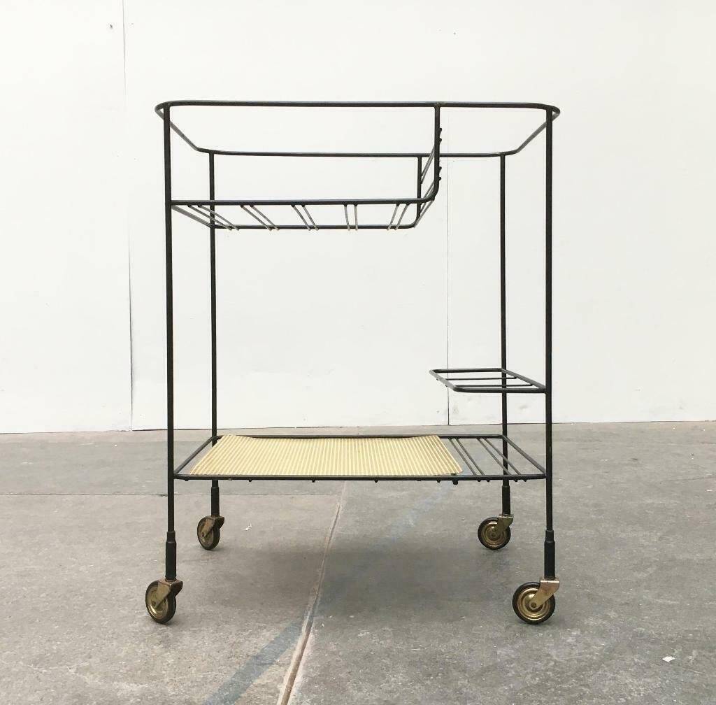 Minimalist perforated metal serving trolley in mid-century style, 1960s.