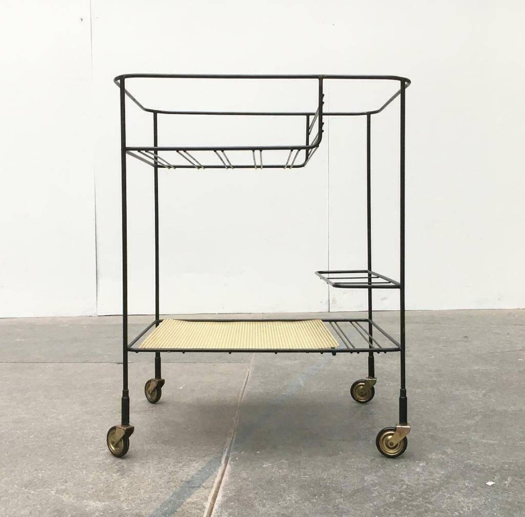 Minimalist perforated metal serving trolley in mid-century style, 1960s.