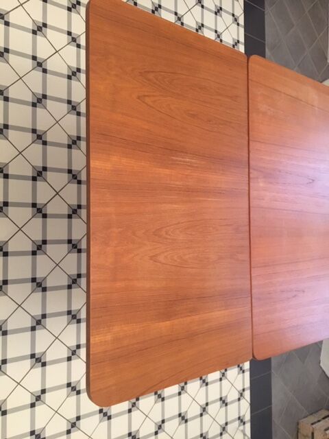 Danish dining table with built-in extension cords