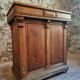 Antique French oak shop counter, kitchen island on wheels, circa 1880–1900.
