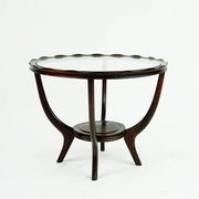 Italian round coffee table from the 1950s with a glass top, attributed to Carlo di Carli.