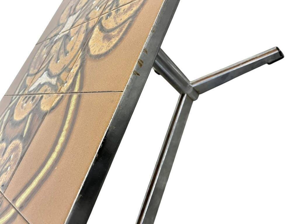 Vintage ceramic coffee table with a chrome frame.
