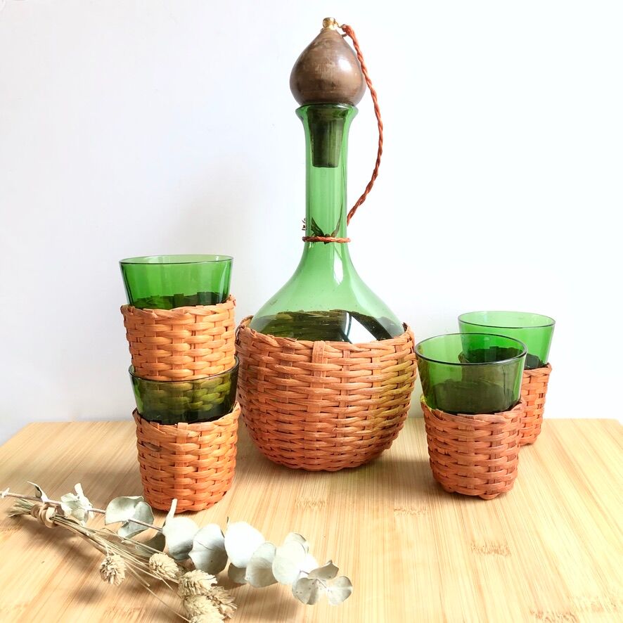 Service carafe and vintage glasses, with wicker