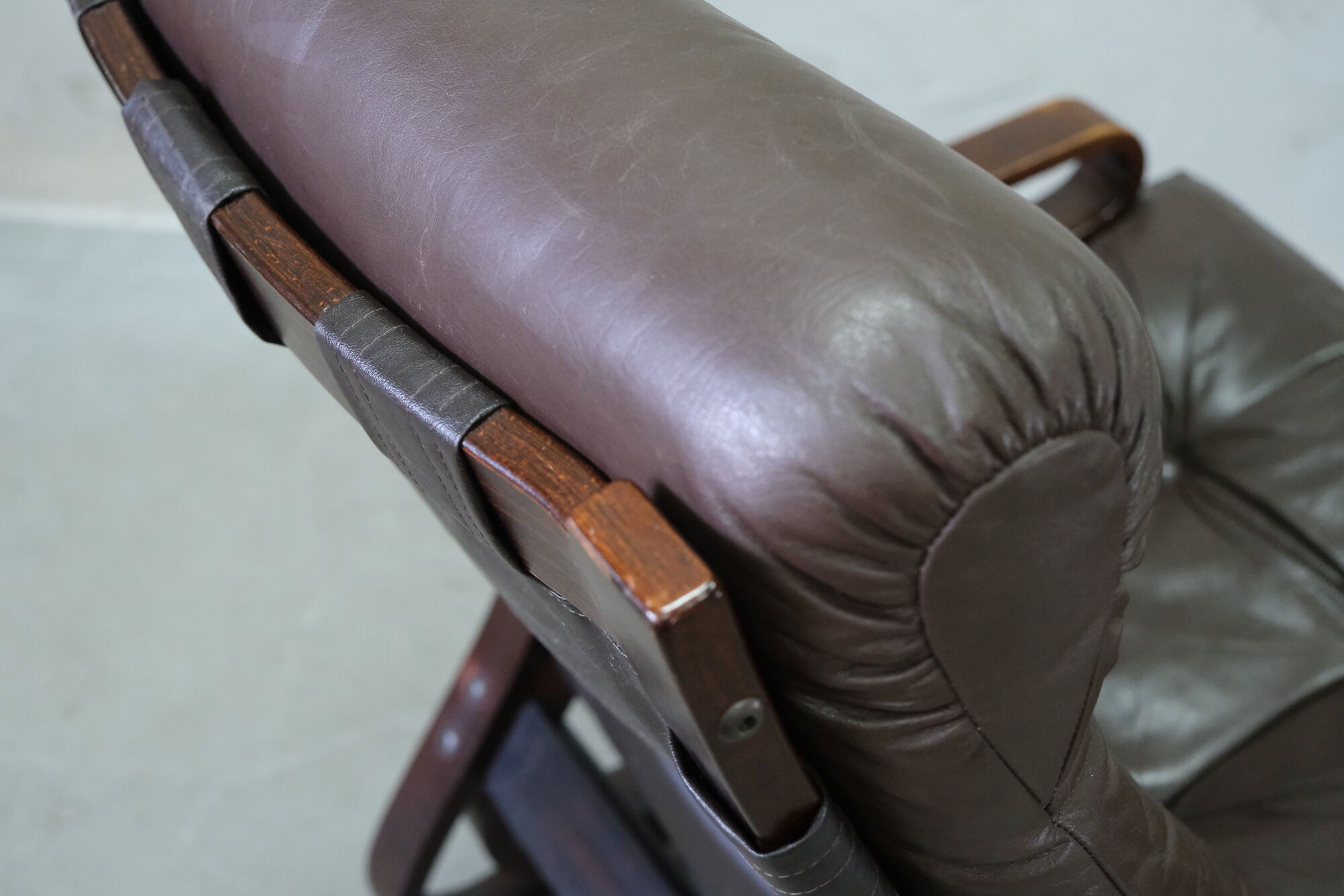 Mid century leather armchair and foot stool by Erda & Nordahl Solheim, Norway 1970's