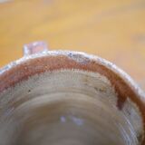 Vintage pitcher in glazed terracotta