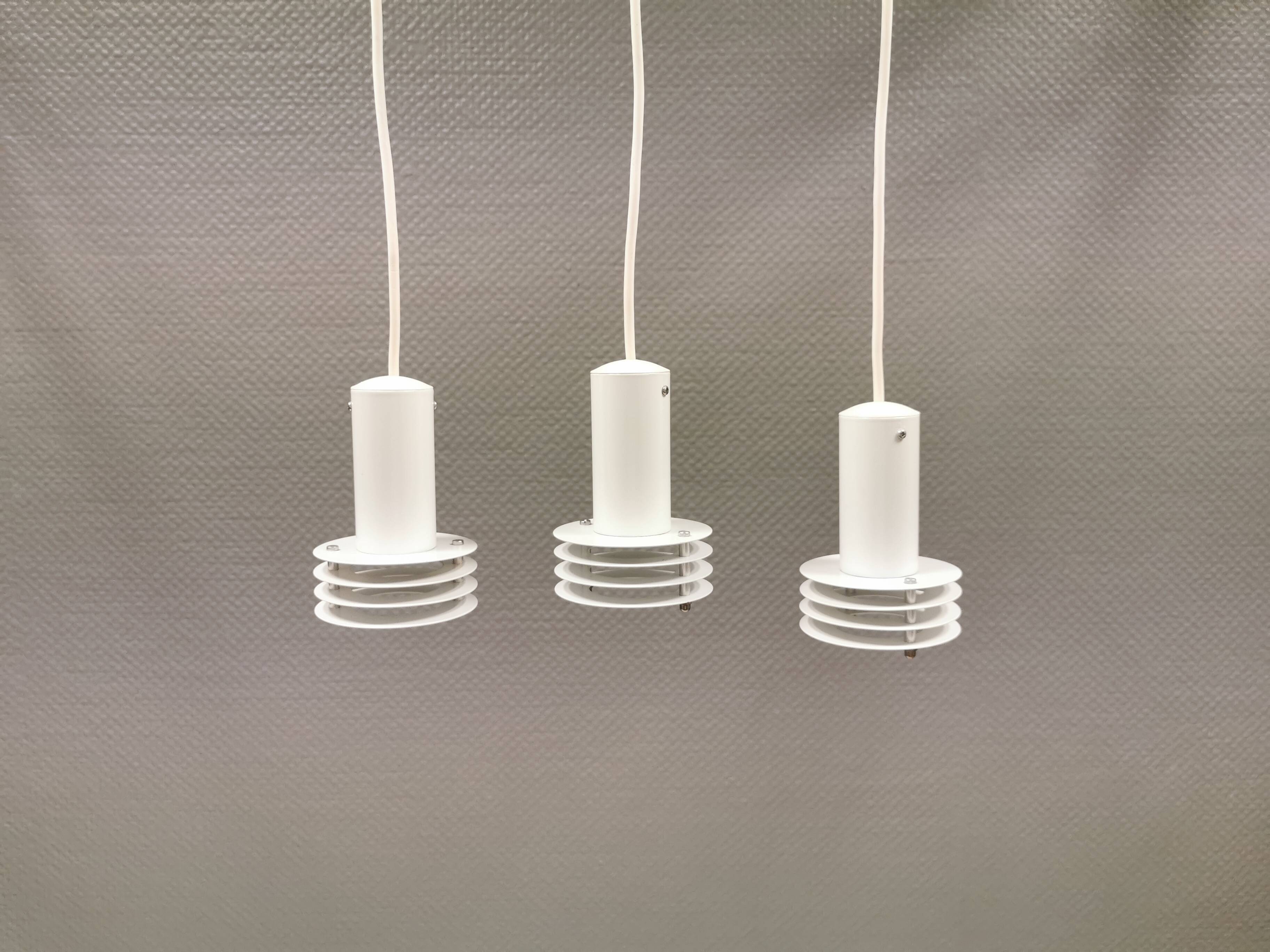 3 minimalistic small hanging lamps from danish lyfa, produced in the 80s.