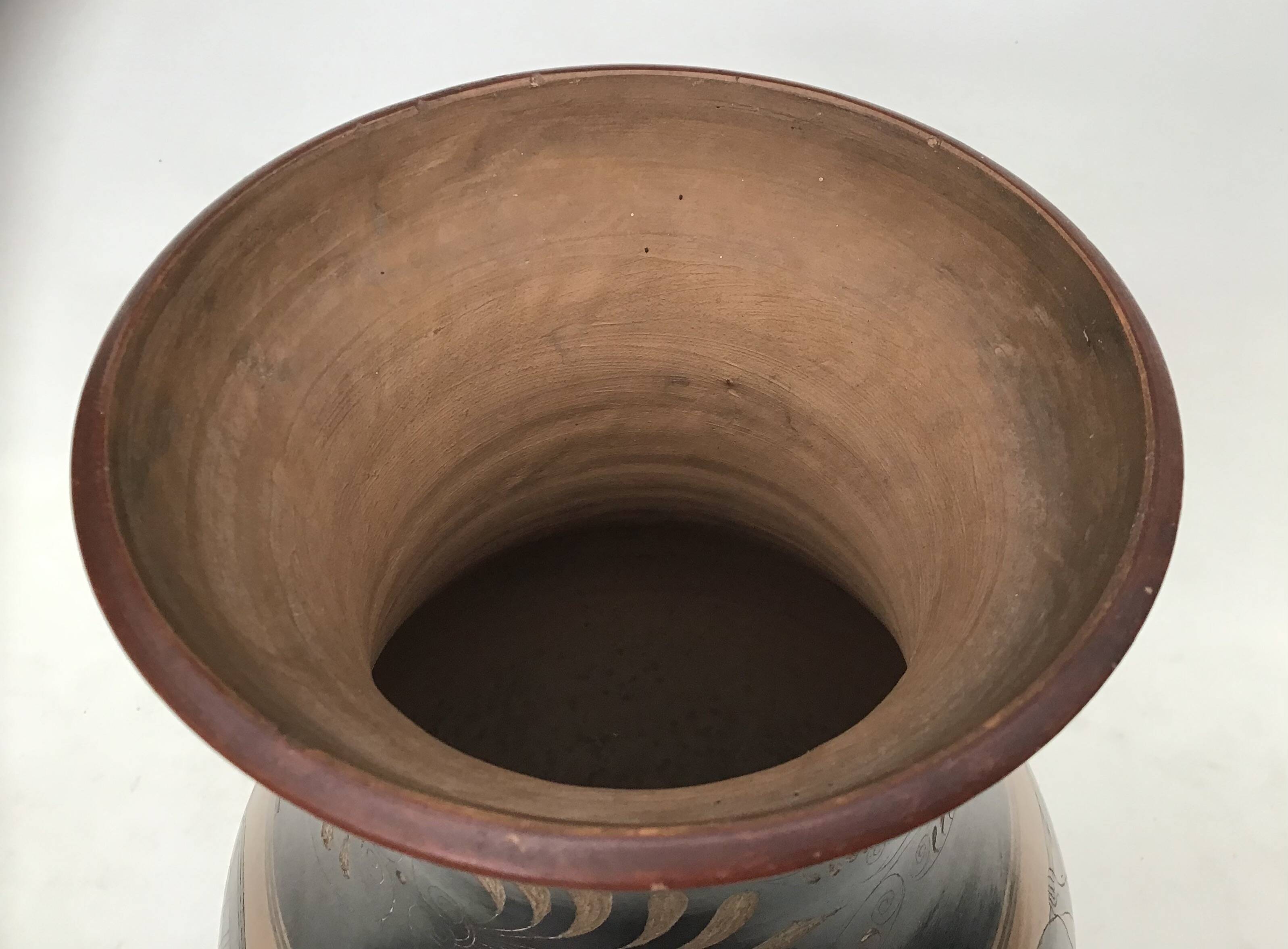 Reproduction of a Greek Attic-style black-figure vase depicting warriors