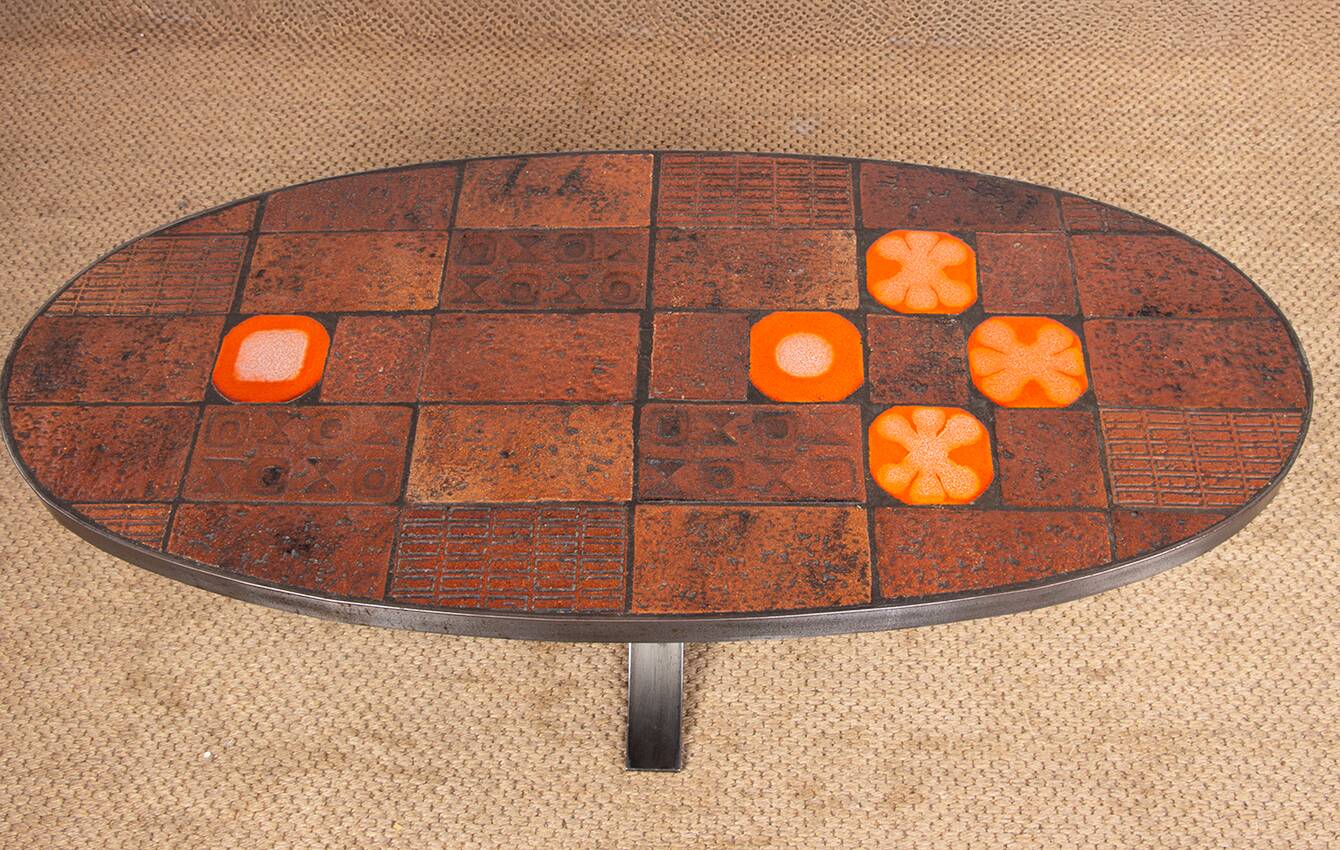 Coffee table in lava stone, ceramic and steel by Jean Jaffeux 1960.