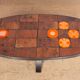 Coffee table in lava stone, ceramic and steel by Jean Jaffeux 1960.