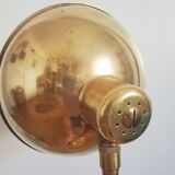 Golden hinged desk lamp