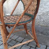 Vintage armchair in braided chestnut leaves, 1940s