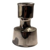 Metal candlestick by Jens Quistgaard for the brand Dansk Designs.